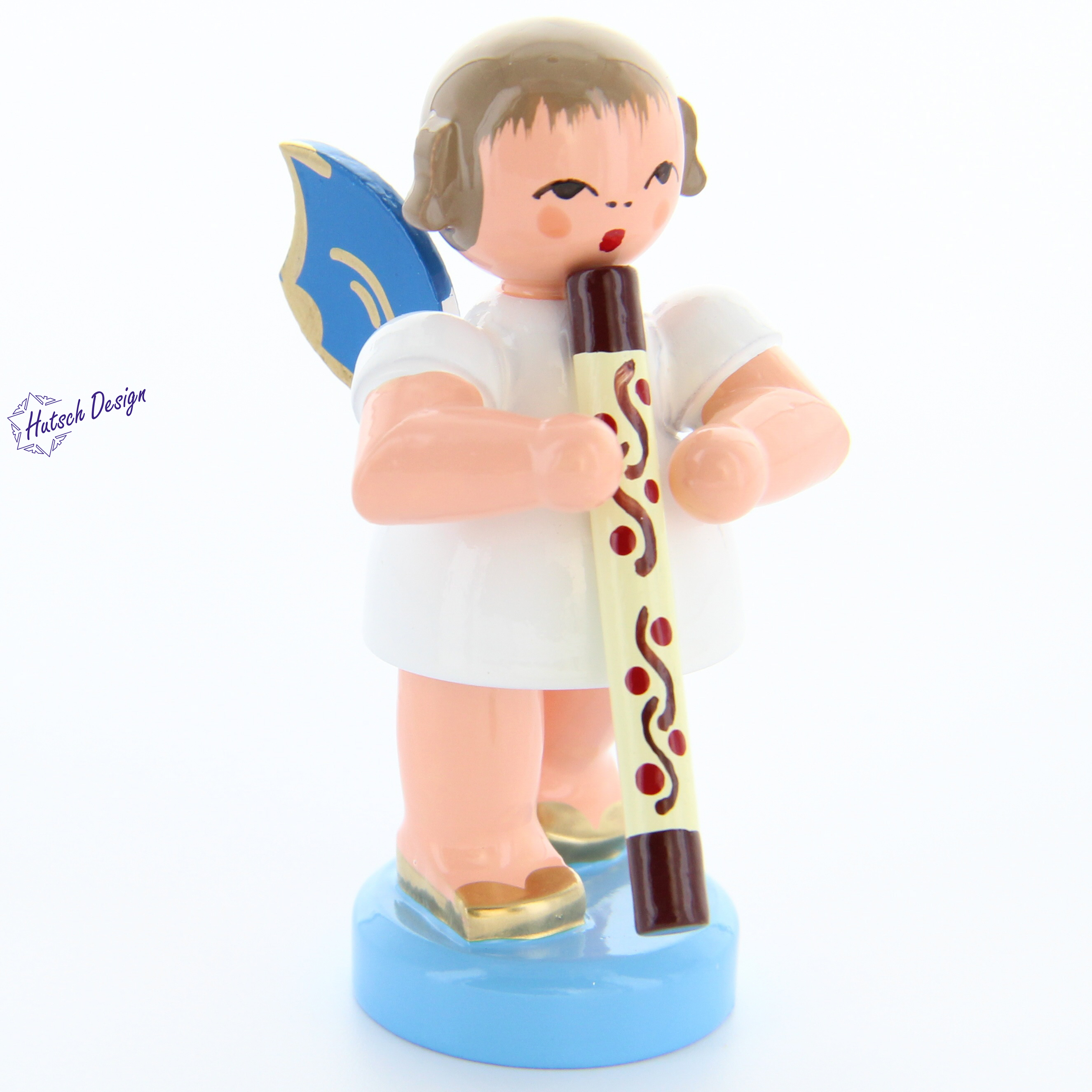 Engel stehend mit Didgeridoo, blaue Flügel Engel stehend mit Didgeridoo, blaue Flügel