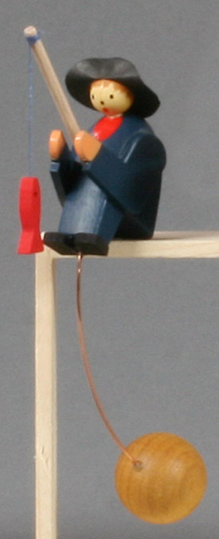 Schaukelfigur Angler
