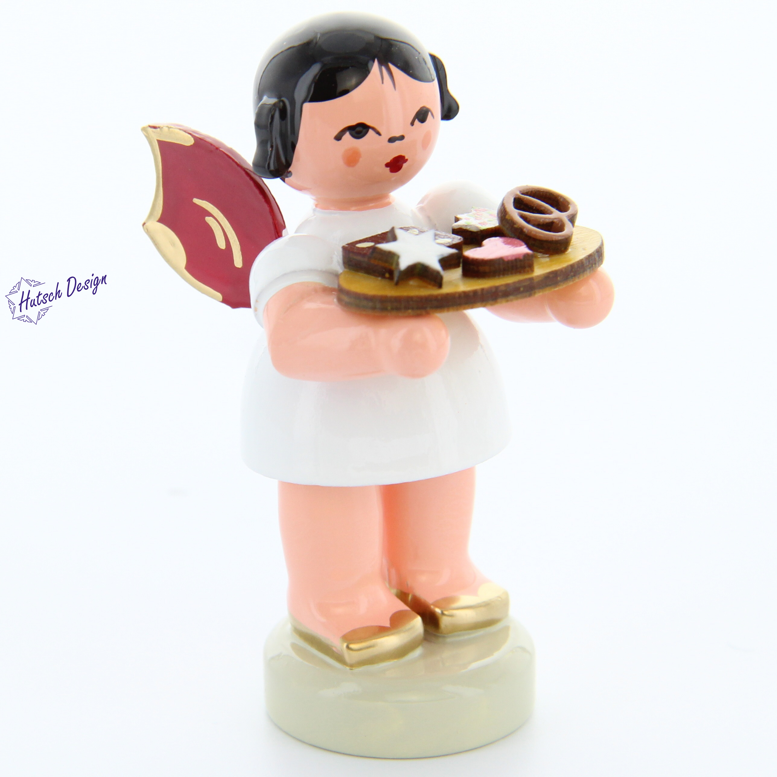Engel stehend mit Lebkuchenblech, rote Flügel Engel stehend mit Lebkuchenblech, rote Flügel