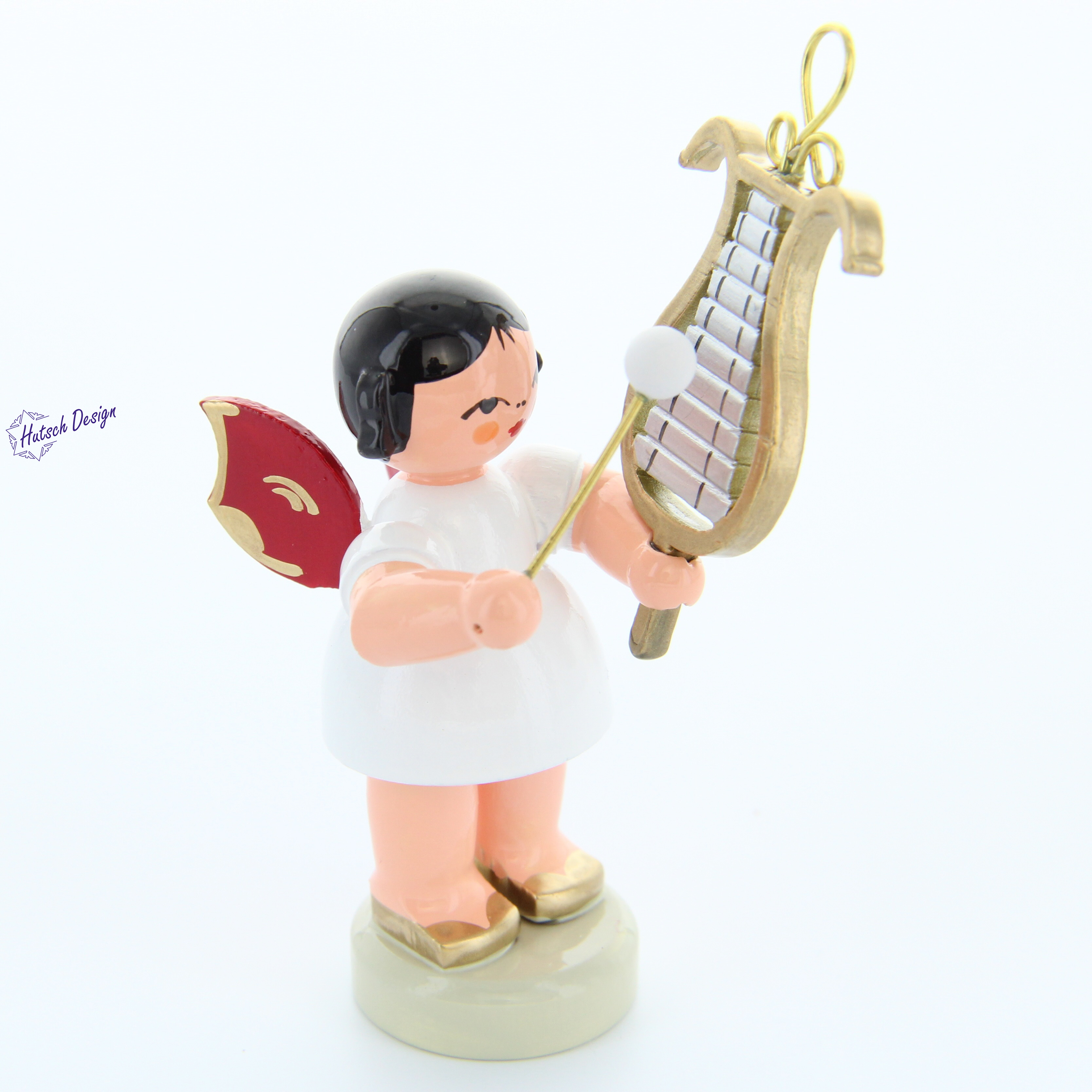 Engel stehend mit Glockenspiel, rote Flügel Engel stehend mit Glockenspiel, rote Flügel