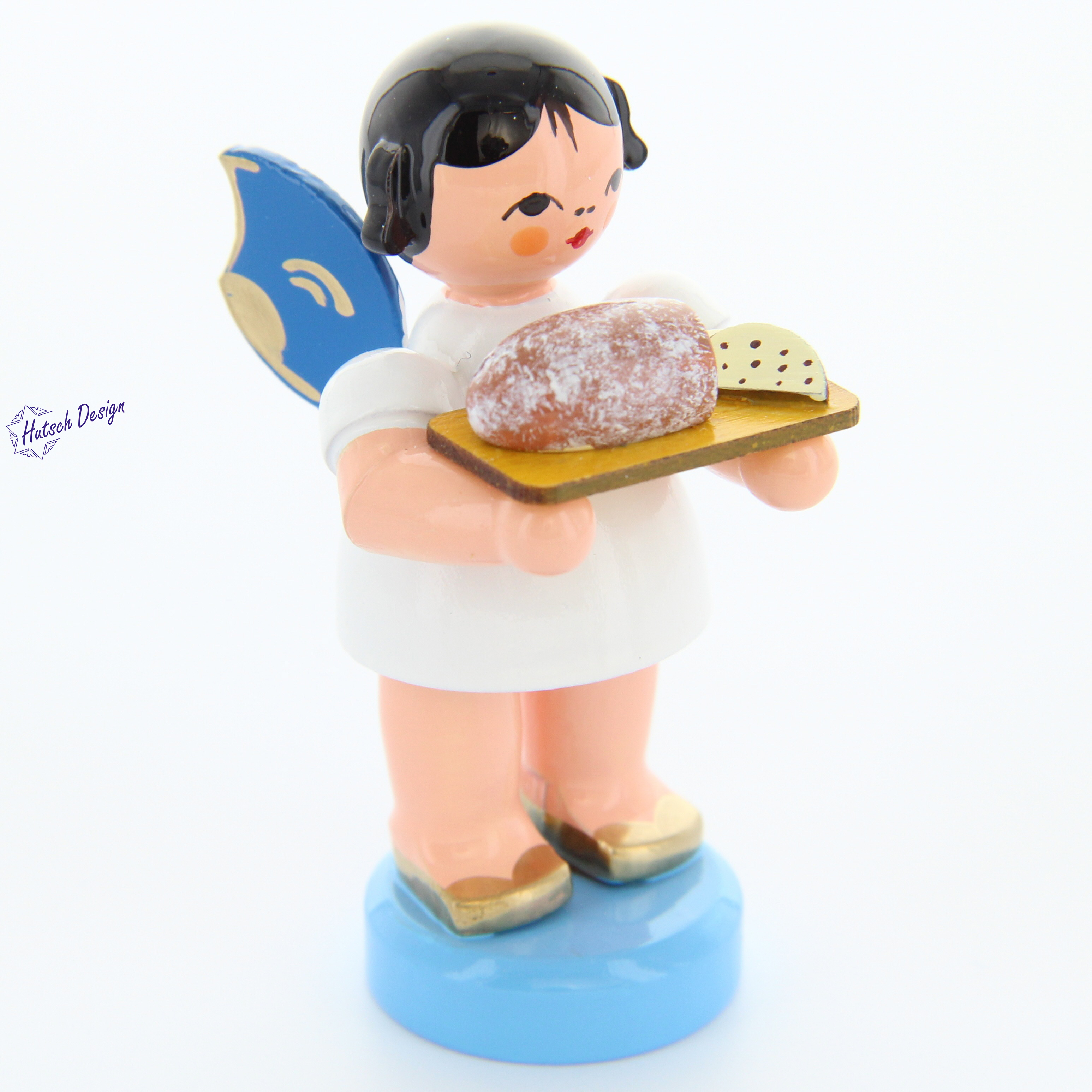 Engel stehend mit Stollenbrett, blaue Flügel Engel stehend mit Stollenbrett, blaue Flügel