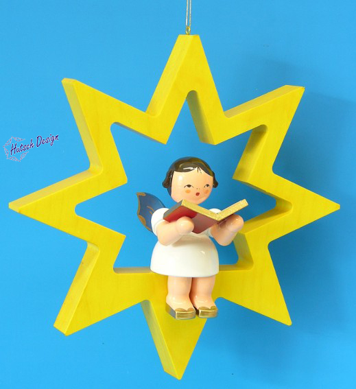 Engel sitzend groß mit Buch, Flügel blau, Stern gelb Engel sitzend groß mit Buch, Flügel blau, Stern gelb