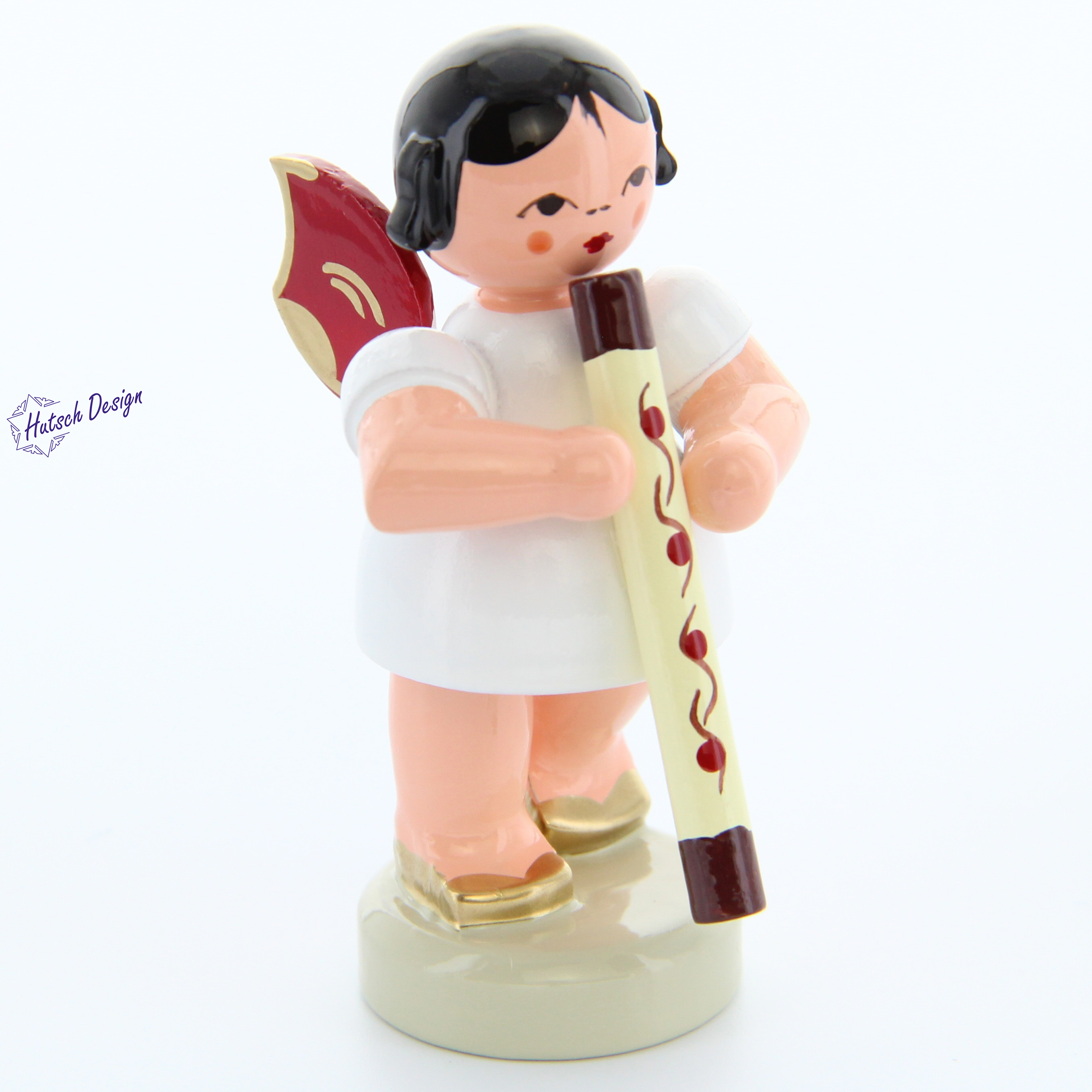 Engel stehend mit Didgeridoo, rote Flügel Engel stehend mit Didgeridoo, rote Flügel
