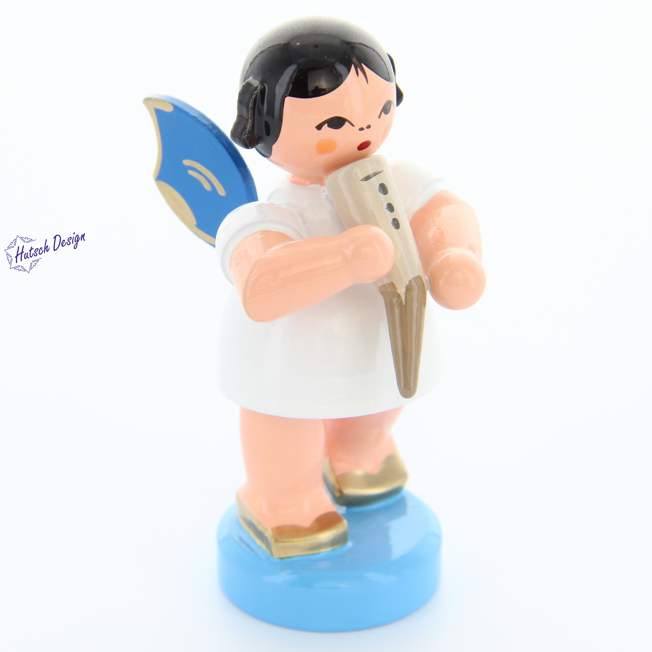 Engel stehend mit Gemshorn, blaue Flügel Engel stehend mit Gemshorn, blaue Flügel