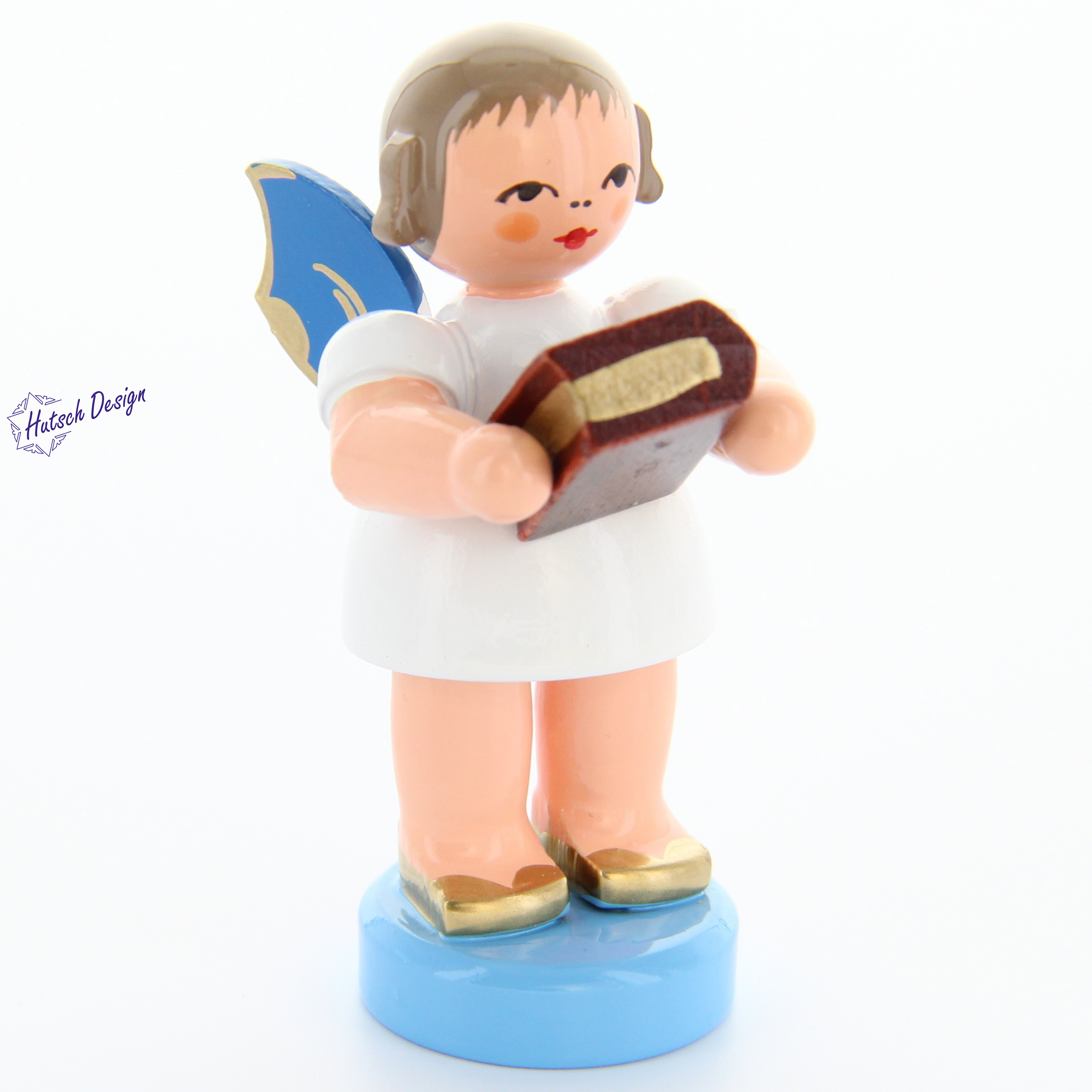 Engel stehend mit Bibel, blaue Flügel Engel stehend mit Bibel, blaue Flügel