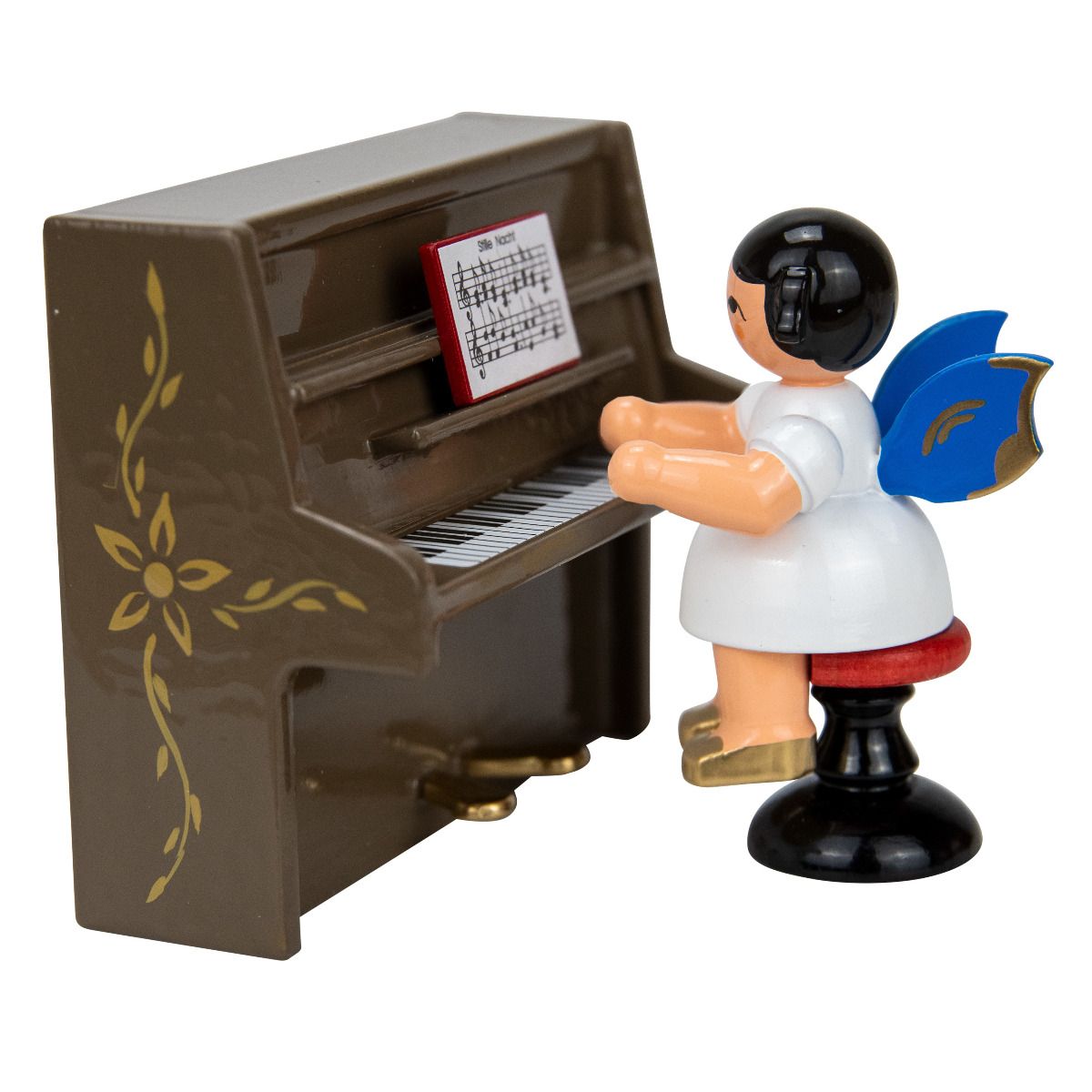 Engel auf Hocker am braunen Klavier, blaue Flügel Engel auf Hocker am braunen Klavier, blaue Flügel