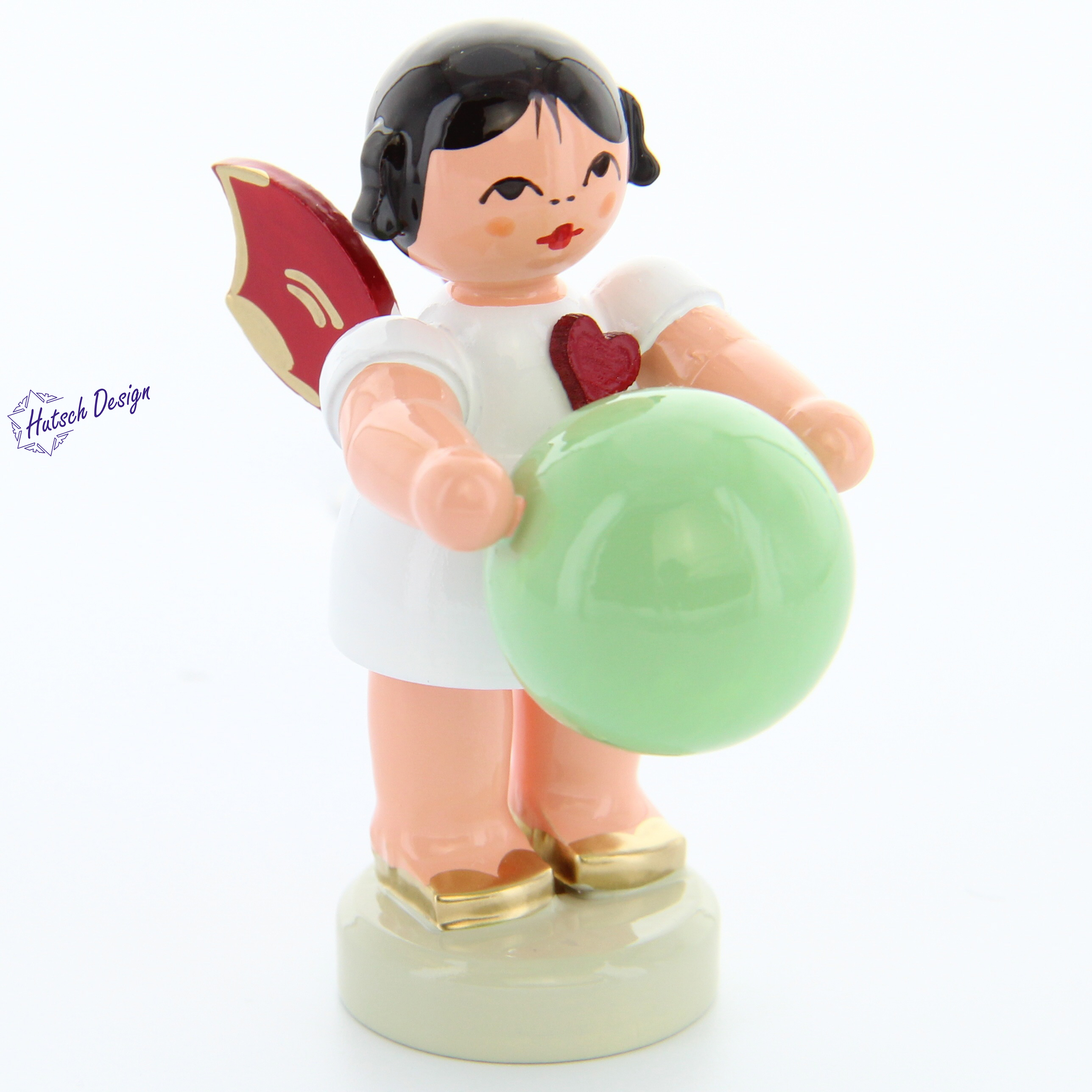 Herzengel stehend mit Gymnastikball, rote Flügel Herzengel stehend mit Gymnastikball, rote Flügel