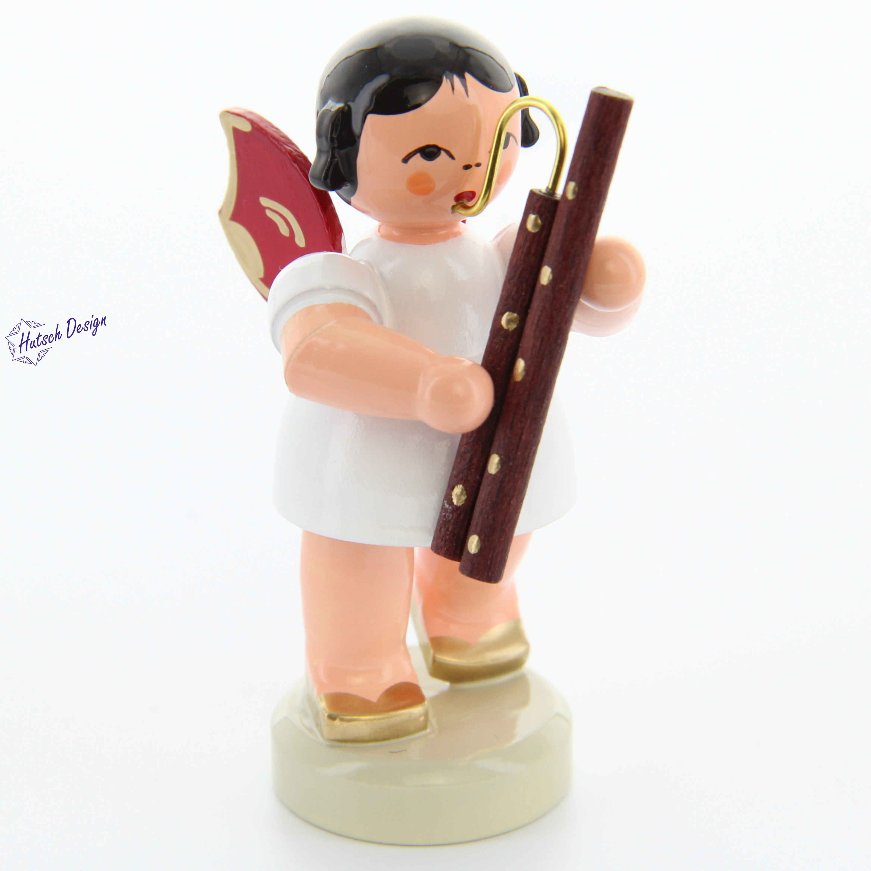 Engel stehend mit Fagott, rote Flügel