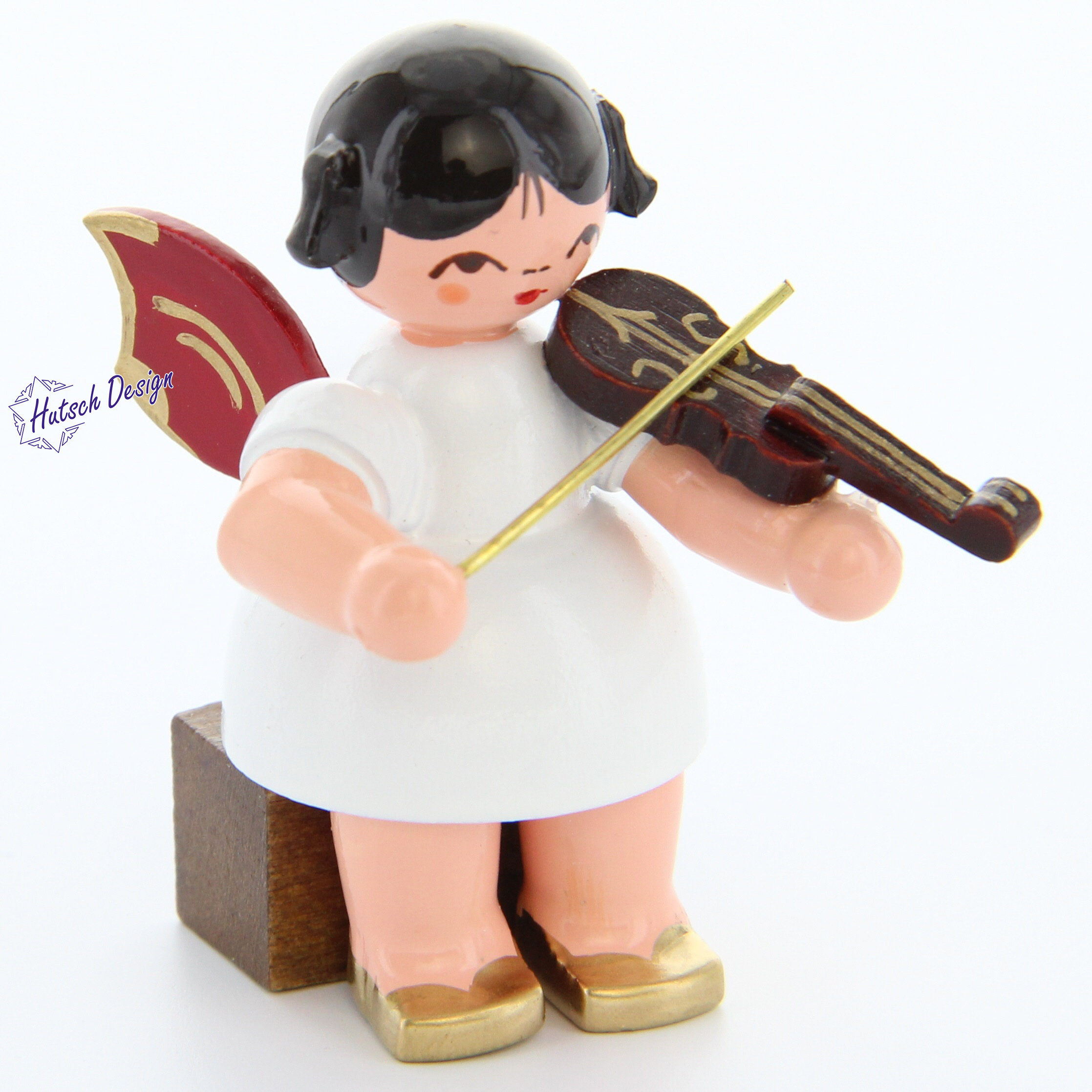 Engel sitzend mit Violine, rote Flügel