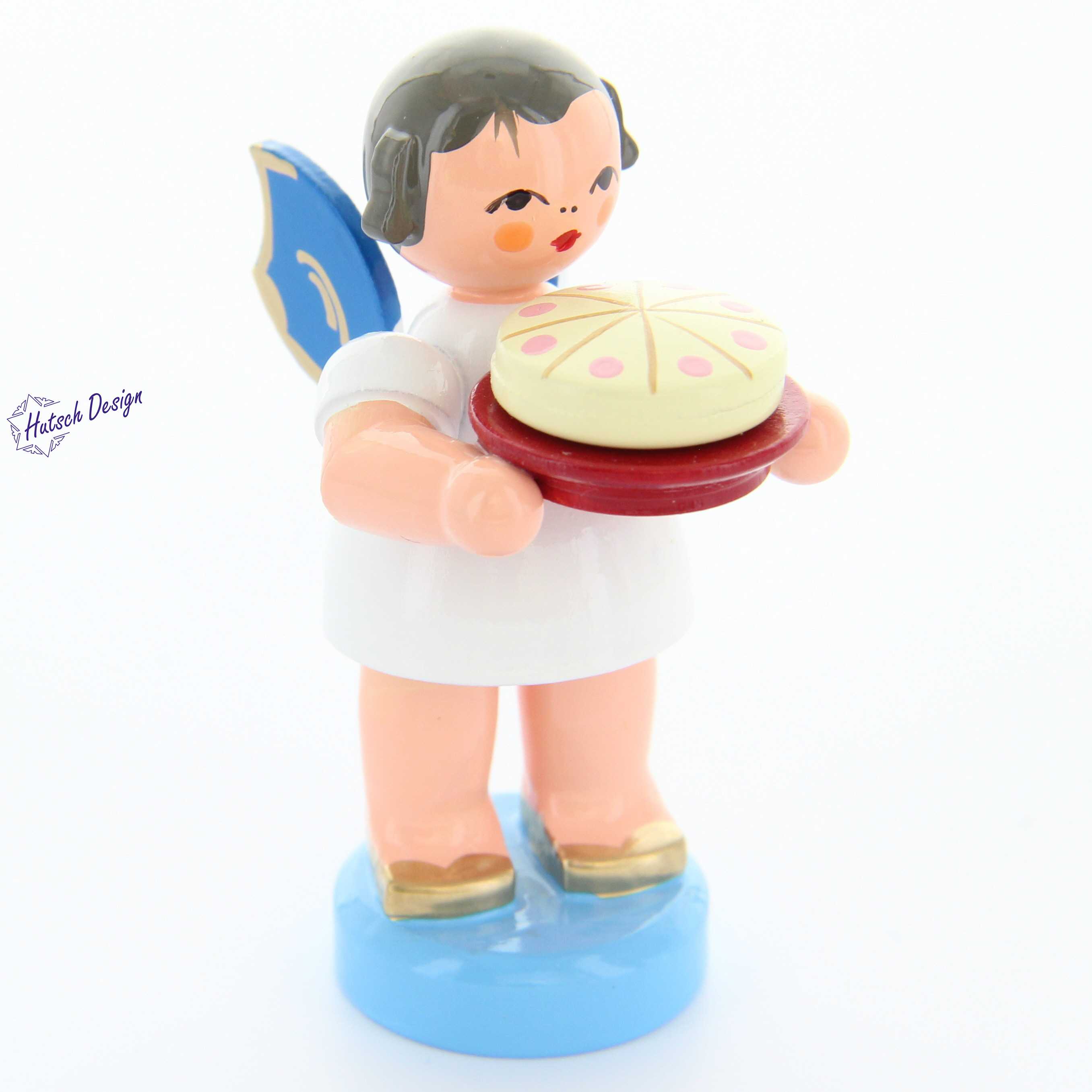 Engel stehend mit Torte, blaue Flügel