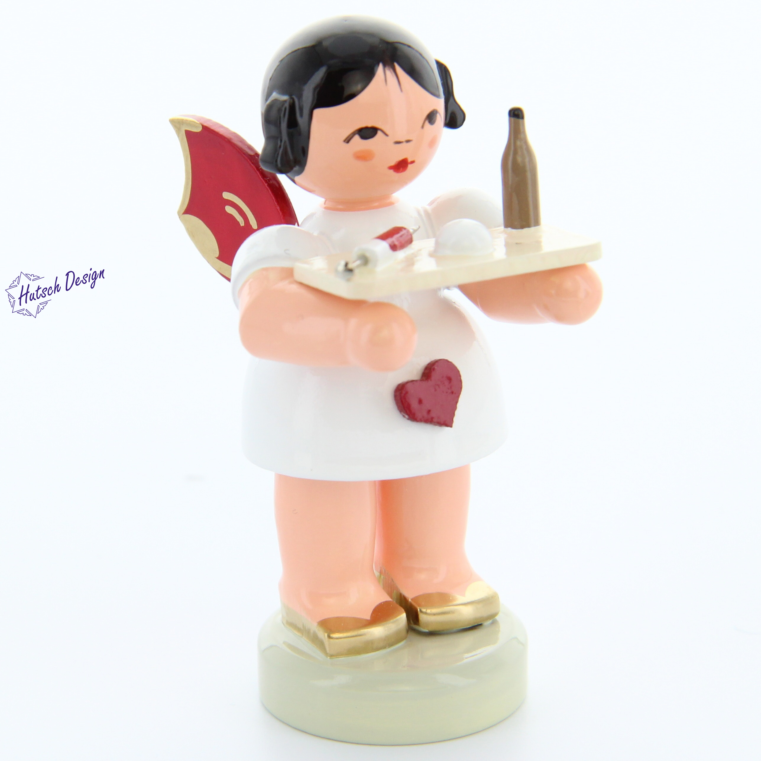 Herzengel stehend mit Spritze, rote Flügel