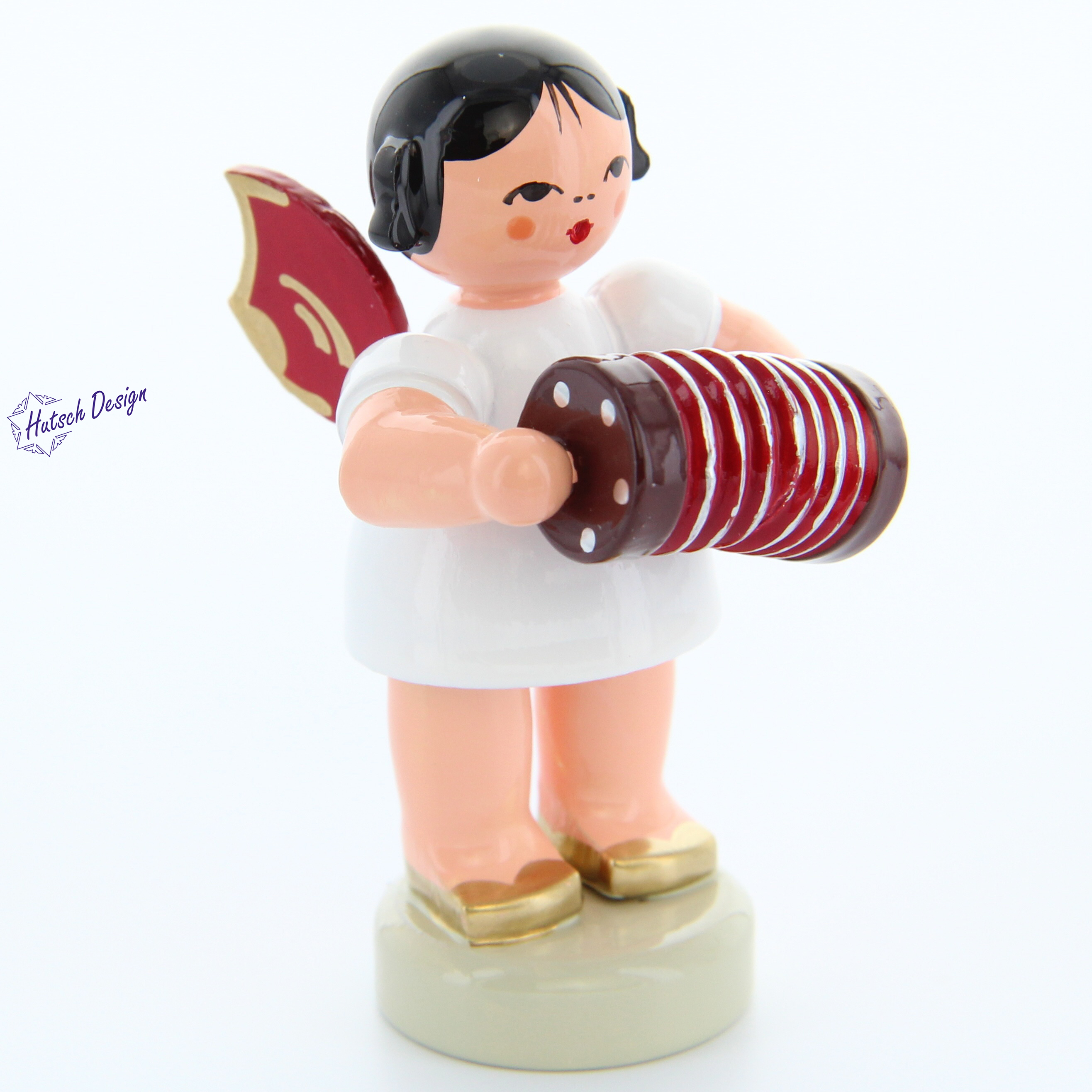 Engel stehend mit Konzertina, rote Flügel