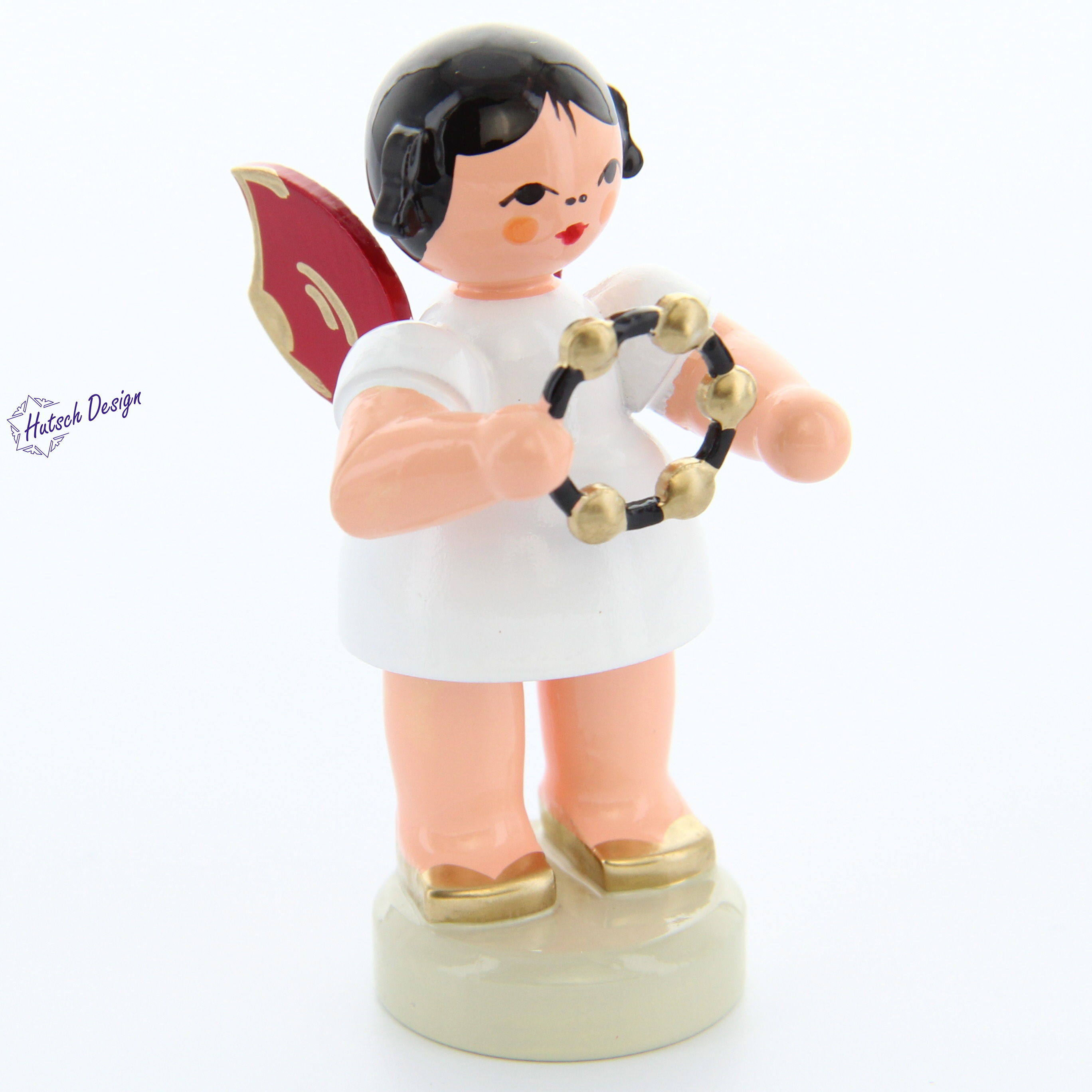 Engel stehend mit Schellenring, rote Flügel