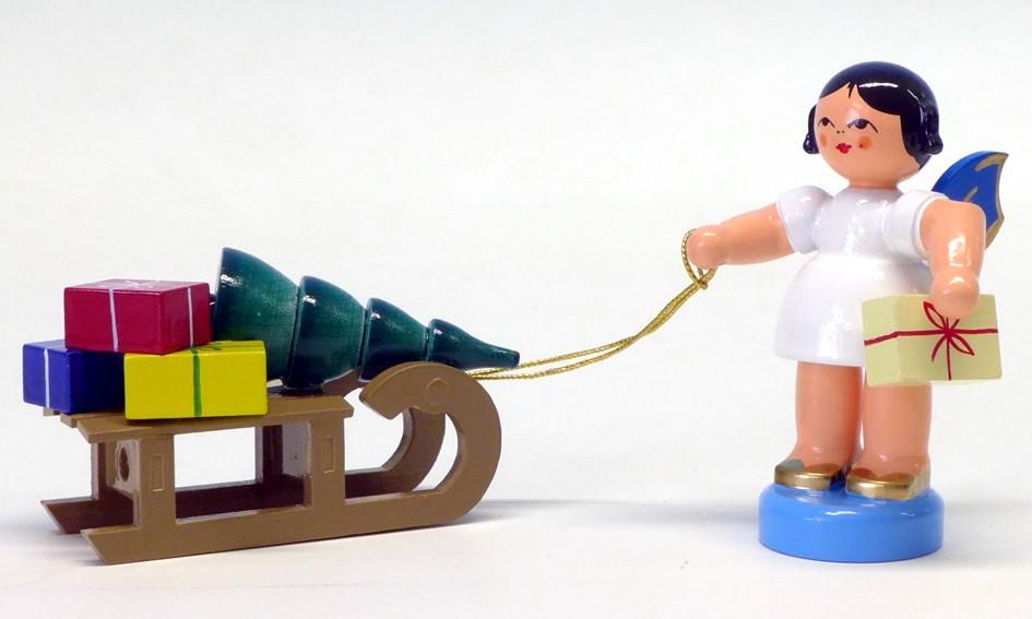 Engel stehend mit Geschenkeschlitten, blaue Flügel
