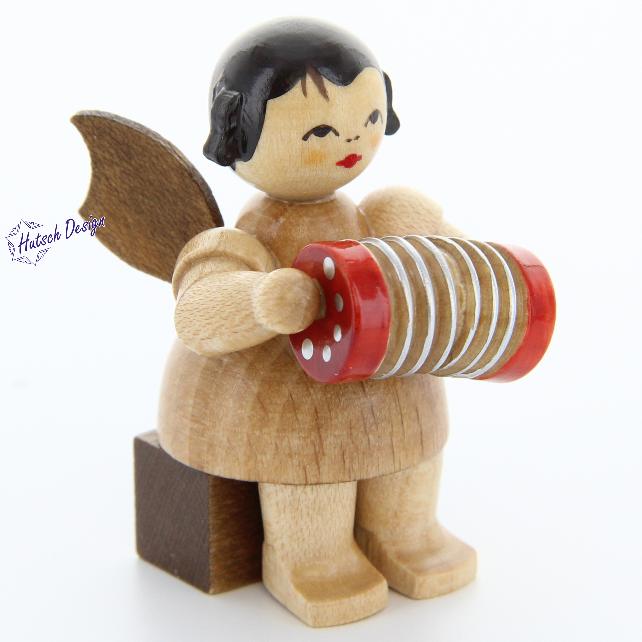 Engel sitzend mit Konzertina, natur