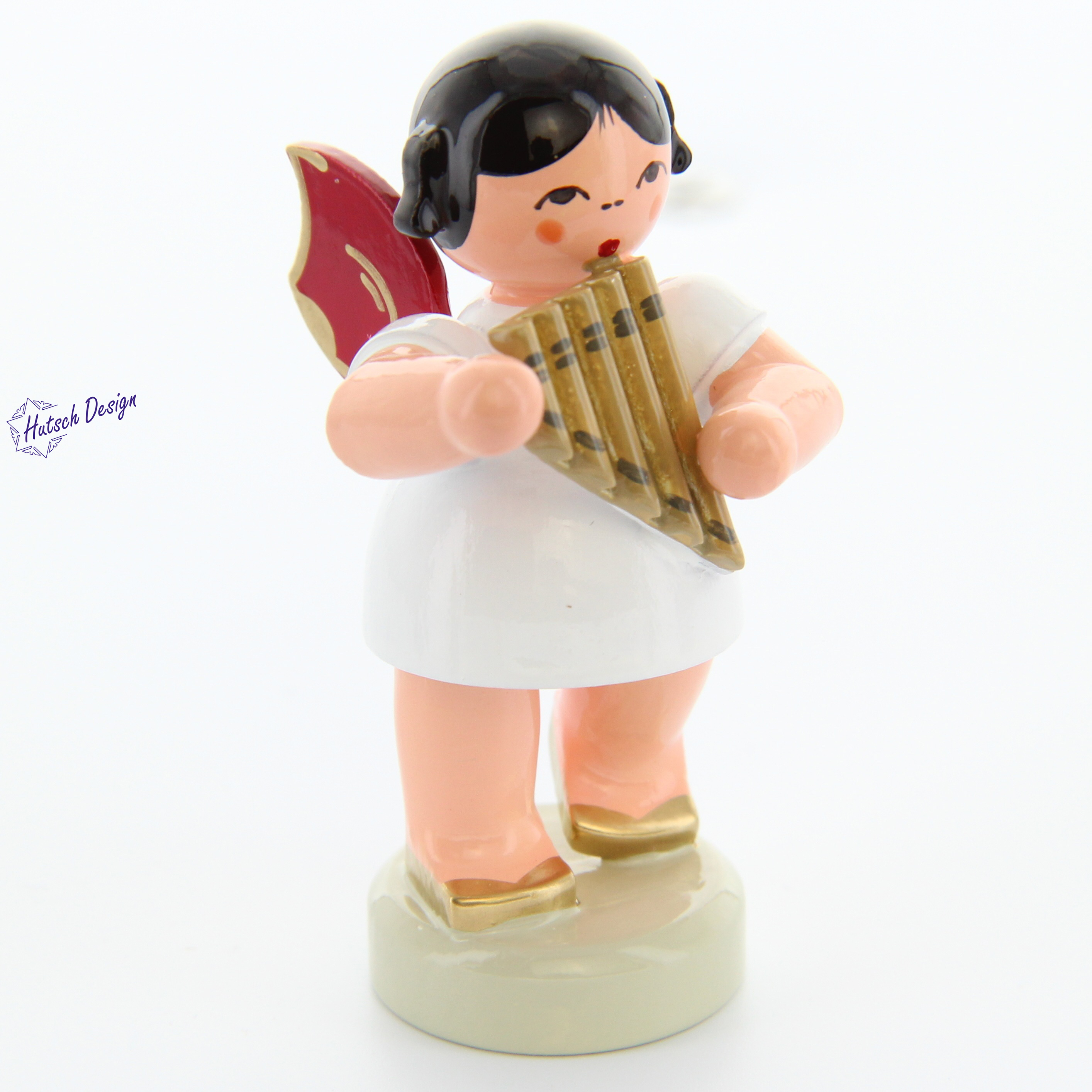 Engel stehend mit Panflöte, rote Flügel