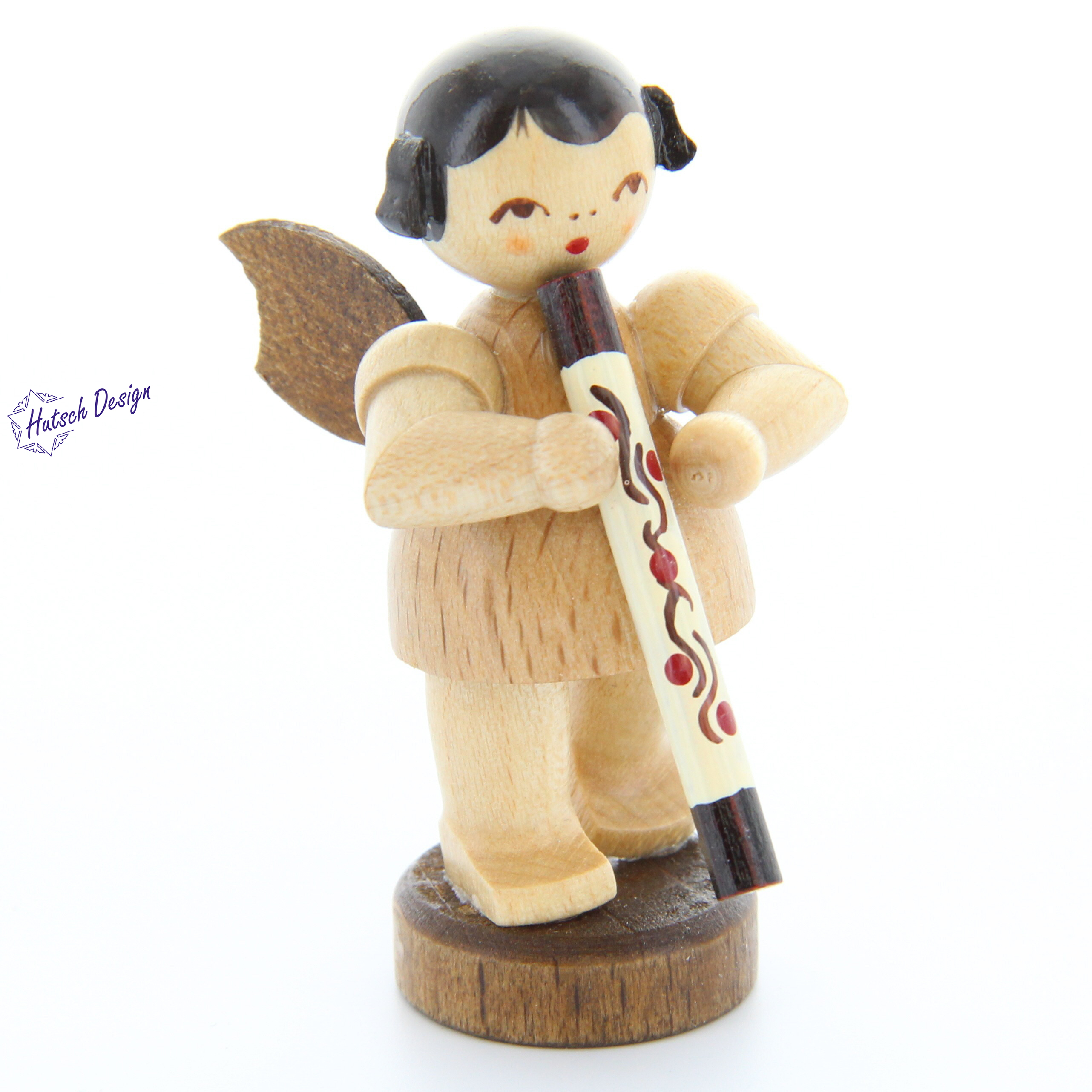 Engel stehend mit Didgeridoo, natur