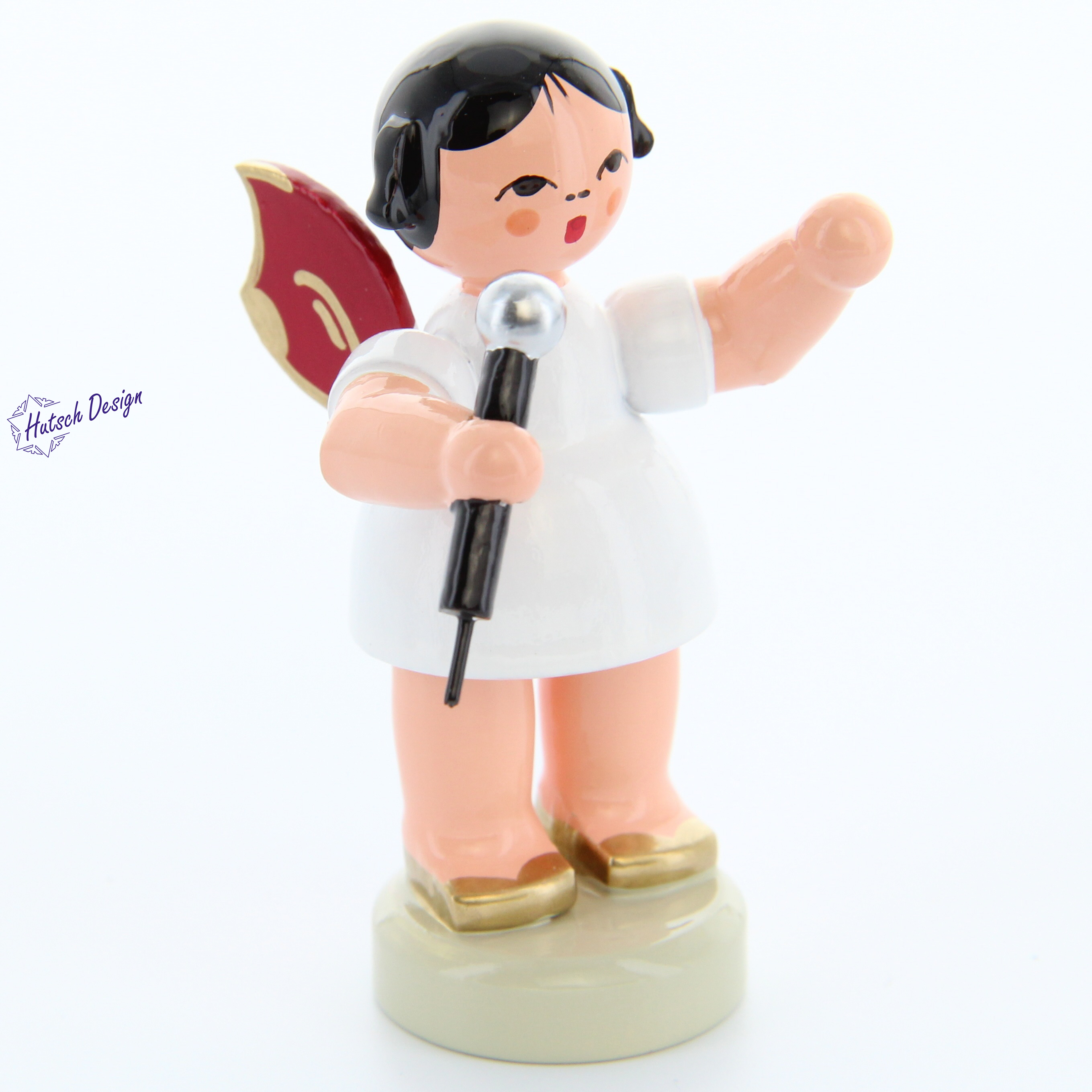 Engel stehend mit Mikrofon, rote Flügel