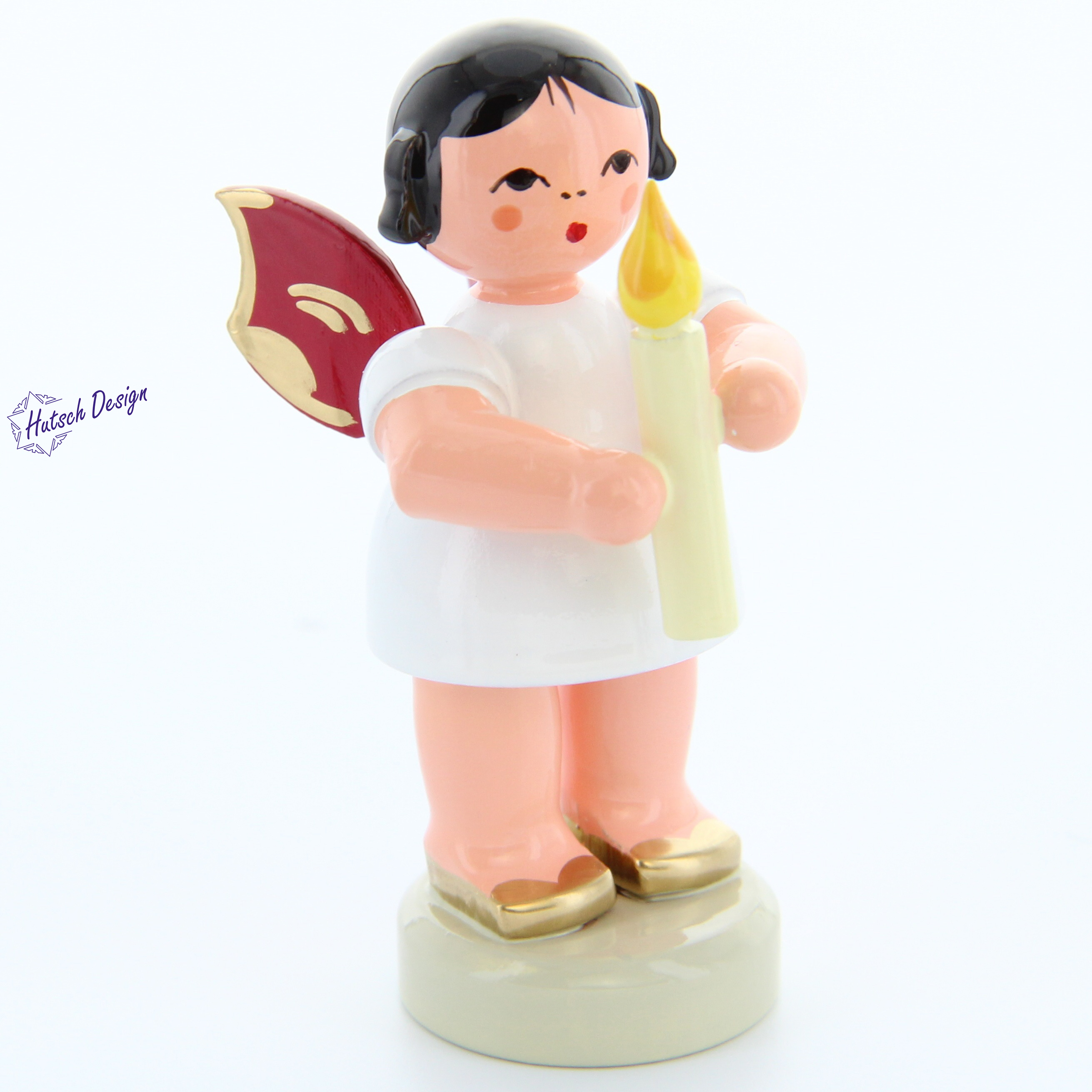 Engel stehend mit Kerze, rote Flügel