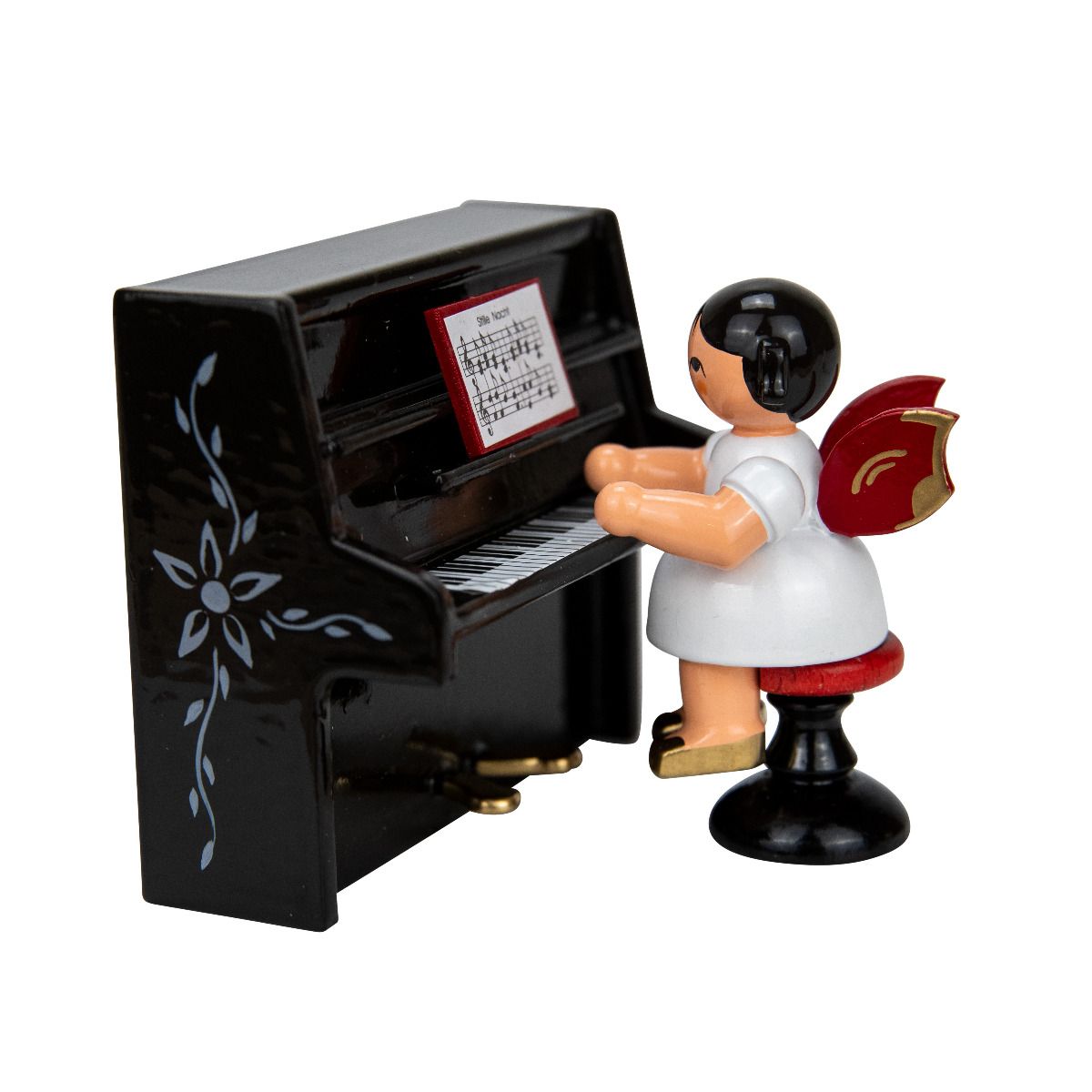 Engel auf Hocker am schwarzen Klavier, rote Flügel